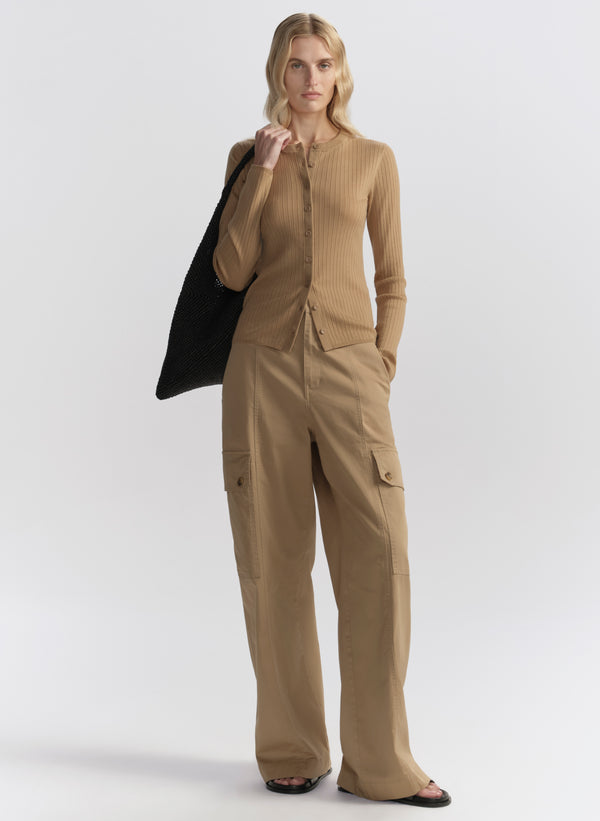 woman wearing tan cardigan and tan cargo pants