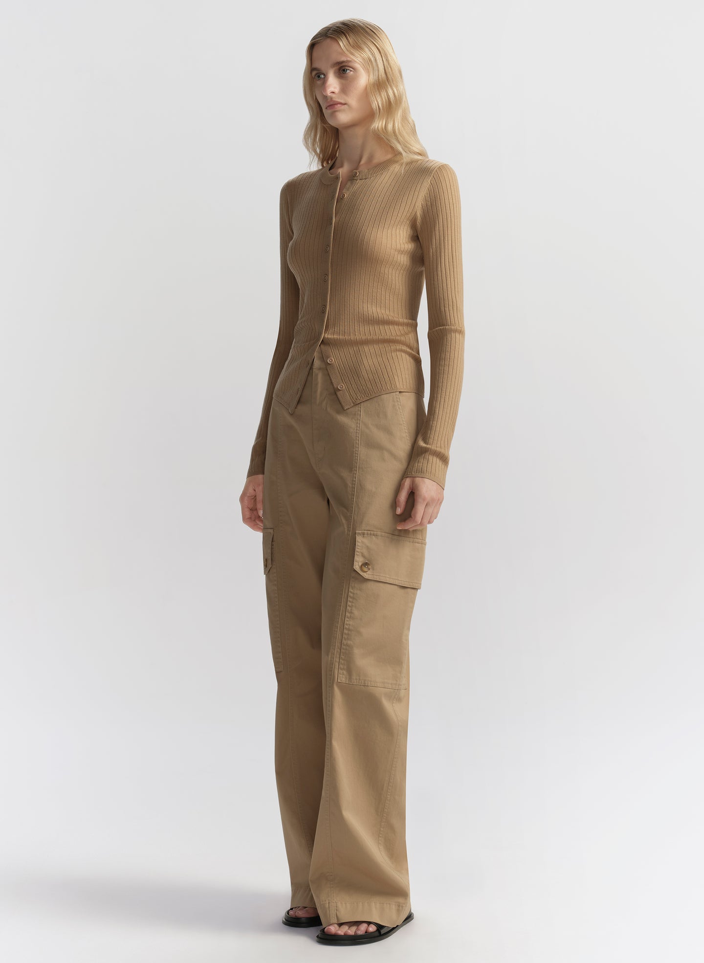 woman wearing tan cardigan and tan cargo pants