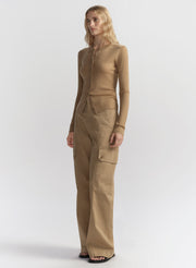 woman wearing tan cardigan and tan cargo pants