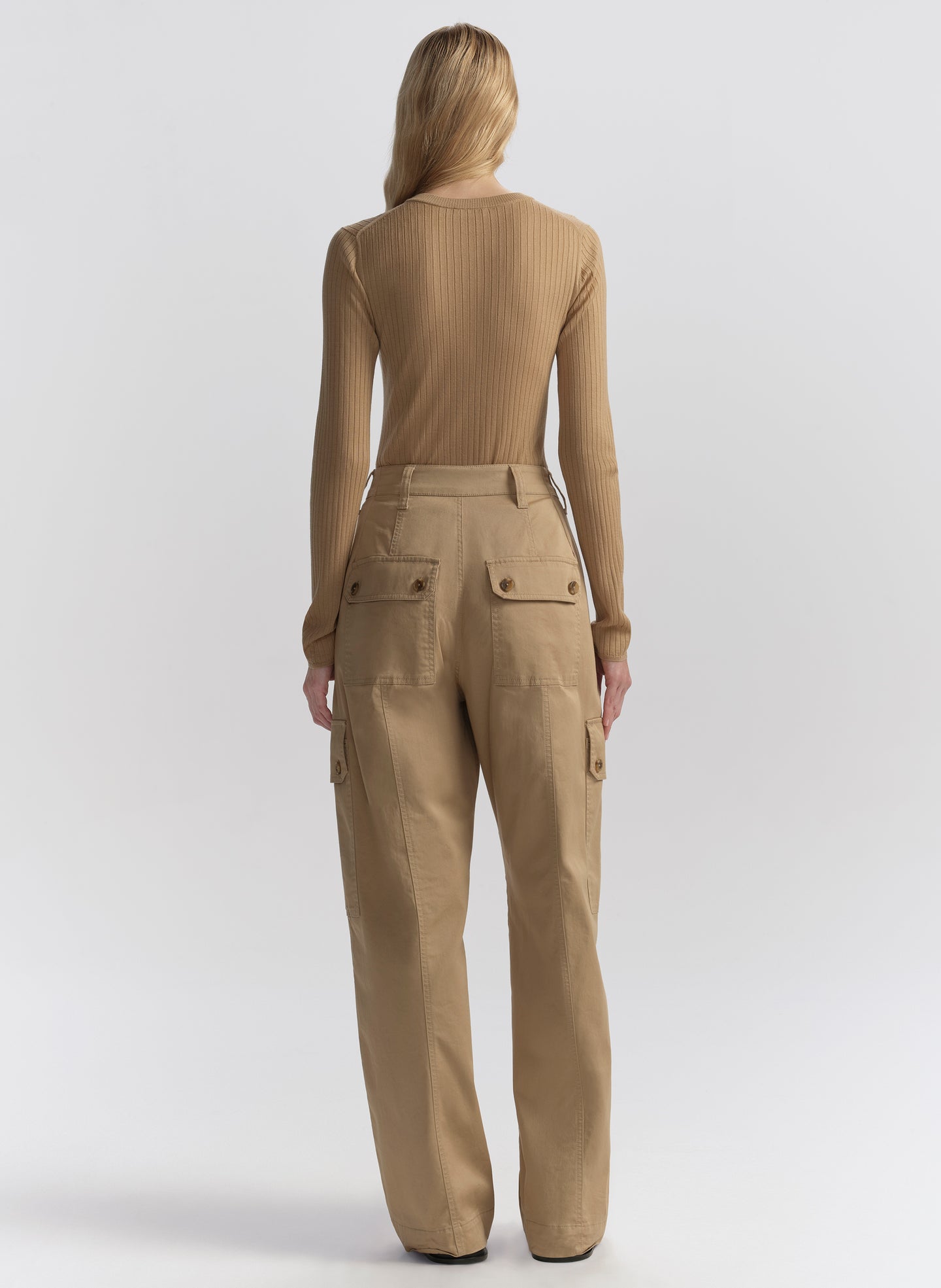 woman wearing tan cardigan and tan cargo pants