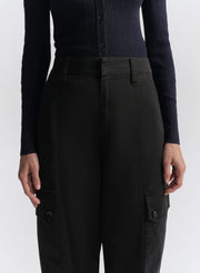 woman wearing navy blue cardigan and navy blue cargo pants