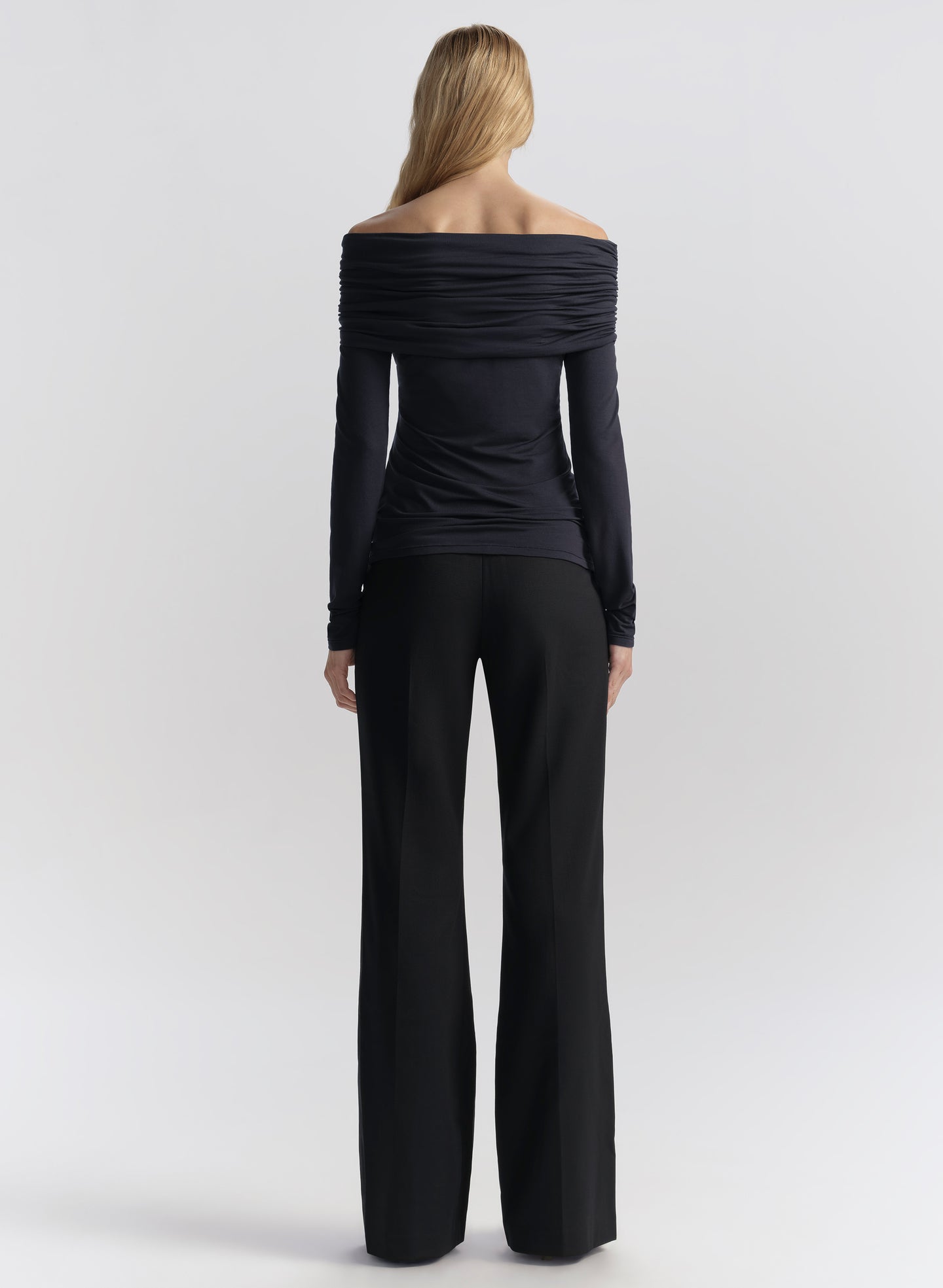 woman wearing off shoulder top and pants