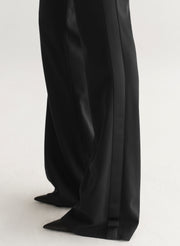 Black satin pants on a white background