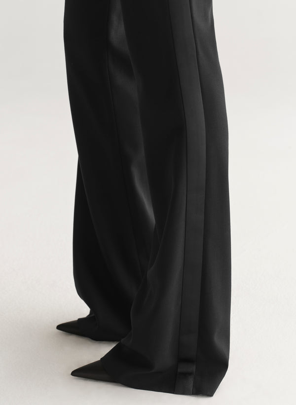 Black satin pants on a white background