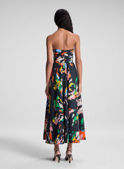 woman wearing black floral strapless midi dress