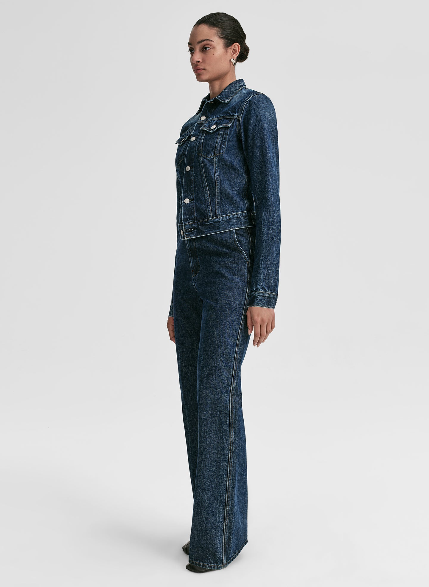 woman wearing jean jacket and jeans