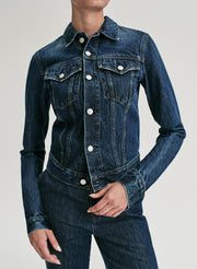 woman wearing jean jacket and jeans