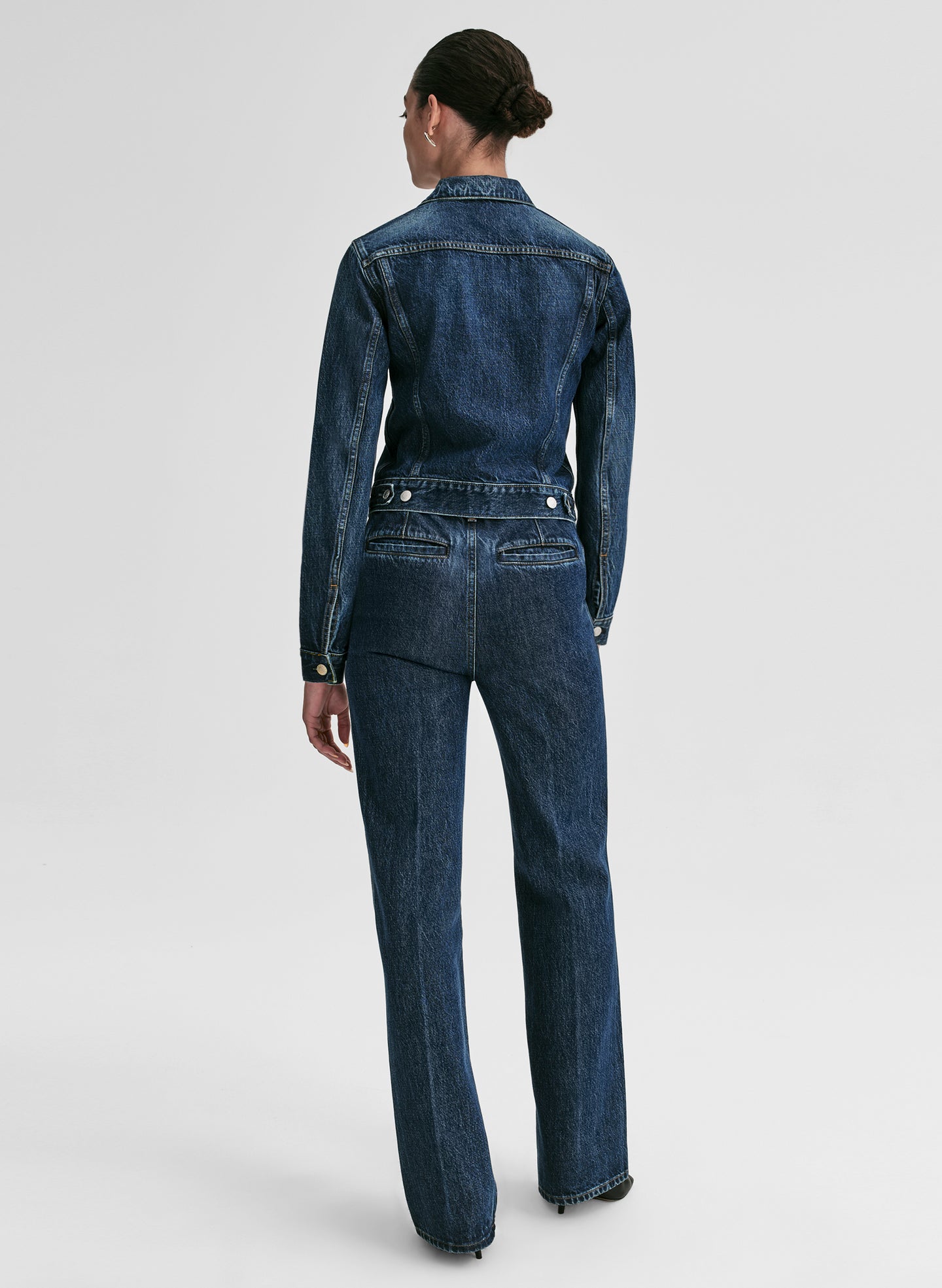 woman wearing jean jacket and jeans