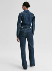 woman wearing jean jacket and jeans