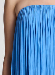 woman wearing blue strapless gown