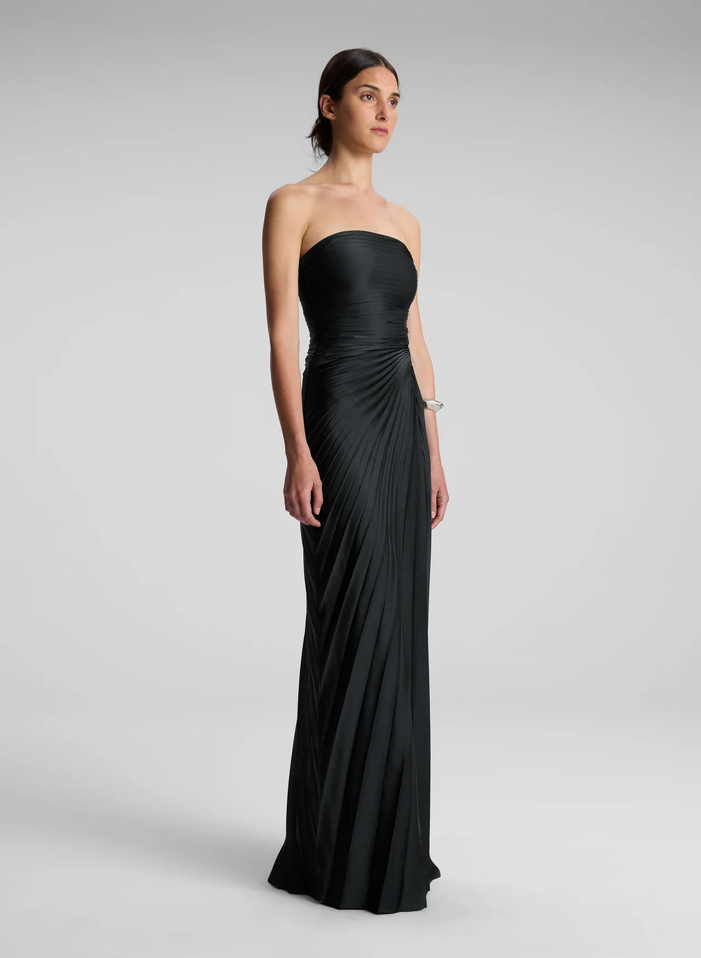 woman wearing black strapless maxi dress
