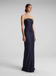 woman wearing navy blue strapless gown