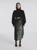 360 degree video view of woman wearing black long sleeve turtleneck wool sweater in cropped length with small split in the front hemline 