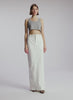 video view of woman wearing grey cropped tank and whit maxi skirt