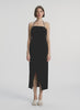 video view of woman wearing black halter neckline ruched midi dress