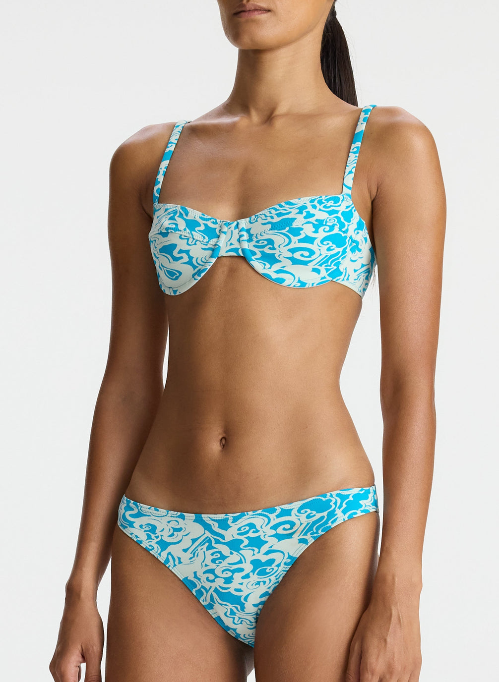 detail view of woman wearing aqua printed bikini set