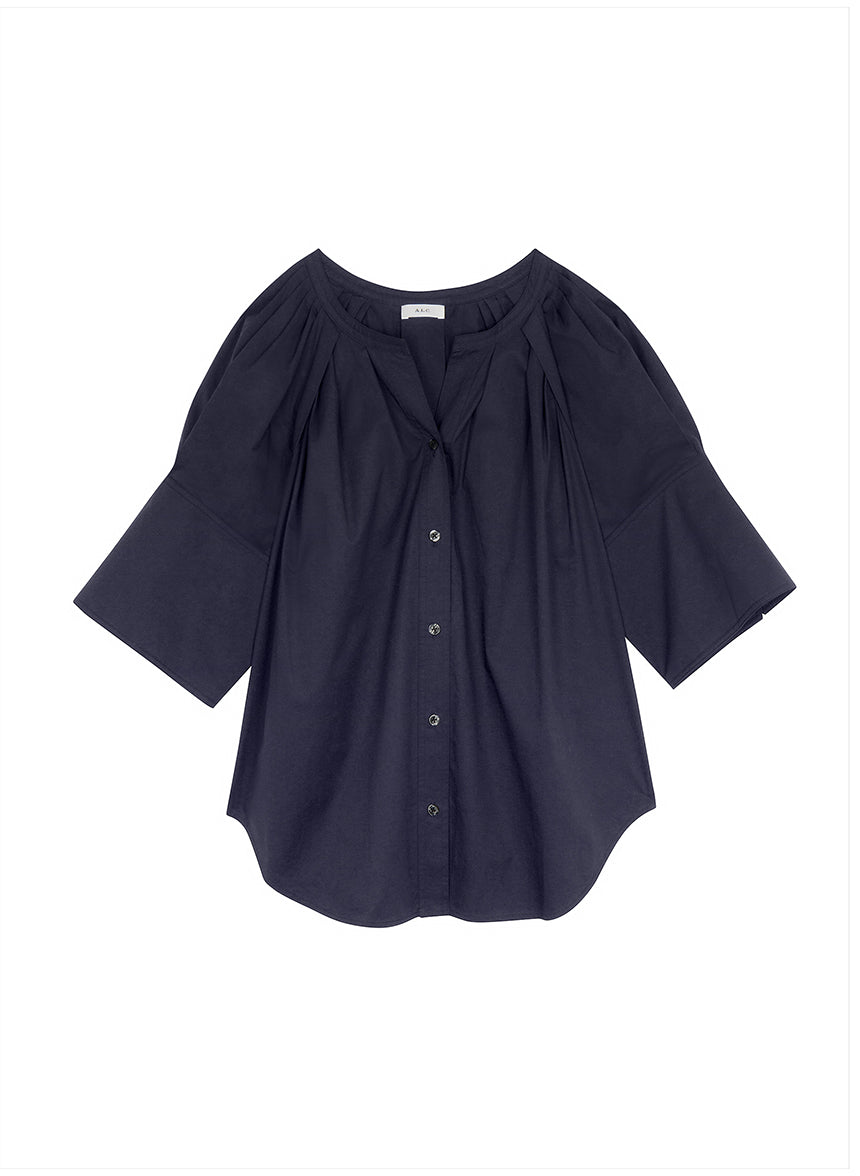 flatlay of navy blue wide sleeve blouse 