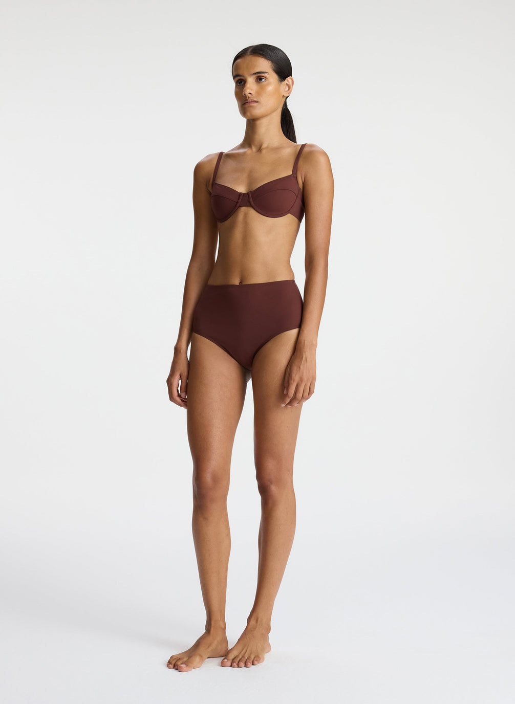 side view of woman wearing brown bikini set